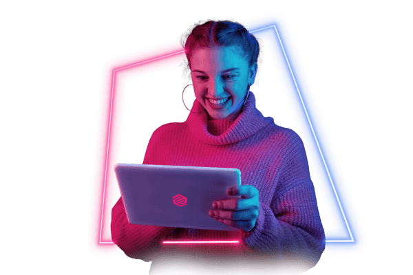 Ruth- neon young woman smiling in front of tablet 2022-02
